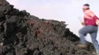 Man runs on top of an active lava flow, is an idiot